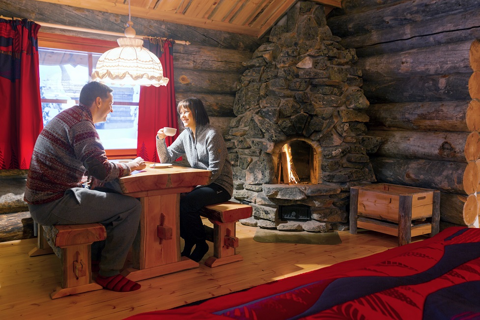 Kakslauttanen West Village small cabin fireplace